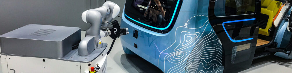 Mobile robot charging a concept car